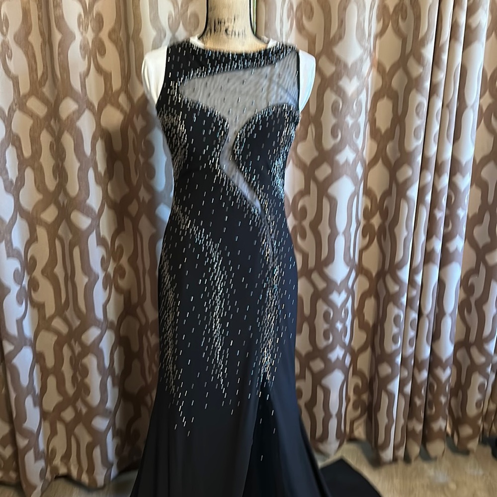Formal black dress with mesh cutouts